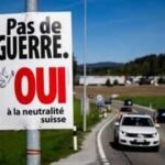 an electoral poster reads no war yes to swiss neutrality is posted along a road in epagny switzerland ap