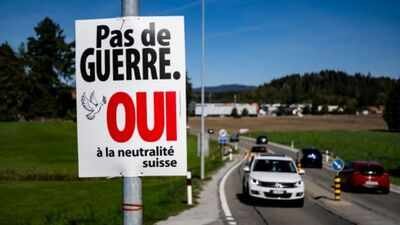 an electoral poster reads no war yes to swiss neutrality is posted along a road in epagny switzerland ap