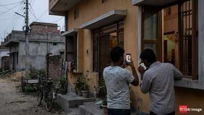 police said that a woman has alleged that two men sexually assaulted her after threatening to circulate photographs and videos of her bathing on social media ai image