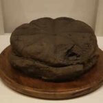 a 2000 year old preserved loaf of bread from herculaneum