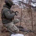a ukrainian service member prepares a starlink satellite internet system at his position near avdiivka inna varenytsiareuters