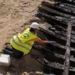 archaeologists uncovered a 15th century ship beneath barcelona during car park construction its wooden hull had around 30 ribs
