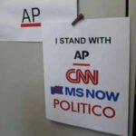 cnn msnow and politico solidarity signs at the white house in washington