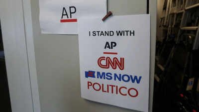 cnn msnow and politico solidarity signs at the white house in washington