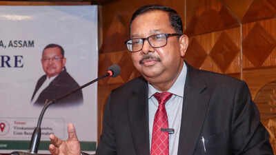 justice bhuyans remarks spark opposition attack on cec