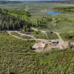 miner creek ranchs 4600 square foot main home features rustic white logs and smooth river rock