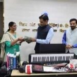oct 30 energy secretary ajay yadav hands over books to miller school principal on fridayjfif