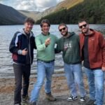 patrick mohr second from left holds up his wedding ring alongside the three italian friends who found it photo credit cbs radio