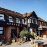 residents oppose plans to turn the former hotel and wedding venue into 42 studio apartments for 65 people