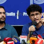 saurav das chief spokesperson of the cockroach janta party cjp speaks next to ashutosh ranka co convenner of cjp during a press conference at the press club of india following their release