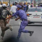 security personell nabbing protester during cjp protest