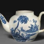 the teapot was about 9cm high and 175cm across its cover was missing while the handle had broken off and been restuck